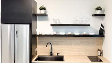 Fridge, microwave, stovetop, coffee/tea maker