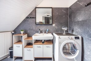 Ducha, secador de pelo, toallas