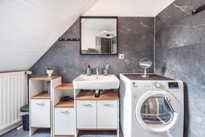 Shower, hair dryer, towels