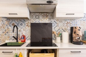 Fridge, microwave, toaster, cookware/dishes/utensils