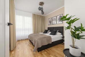 1 bedroom, desk, iron/ironing board, travel crib
