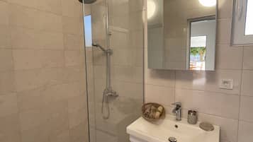 Hair dryer, bidet, towels, soap