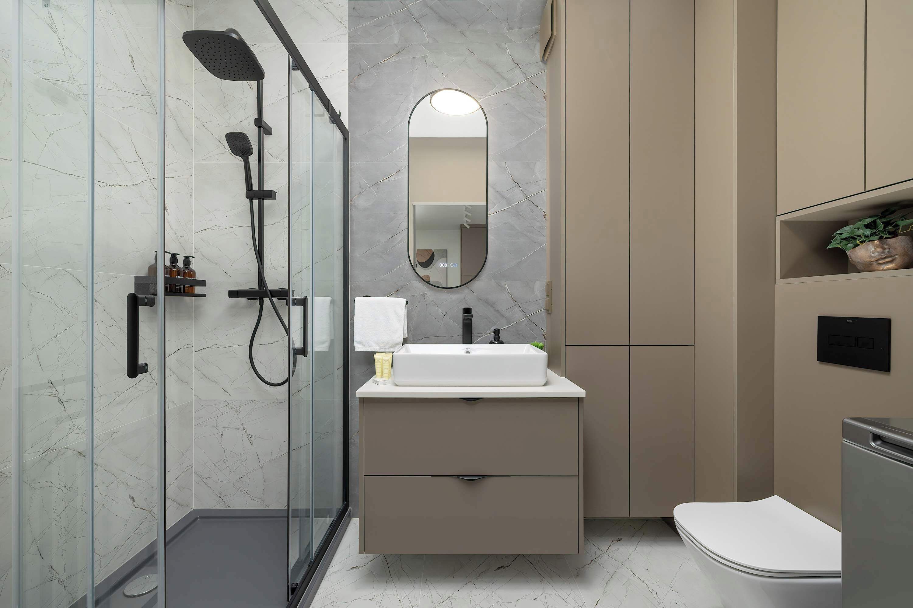 Shower, hair dryer, towels, shampoo
