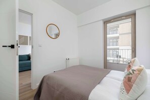 1 bedroom, desk, iron/ironing board, travel cot