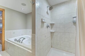 Shower, hair dryer, towels, shampoo