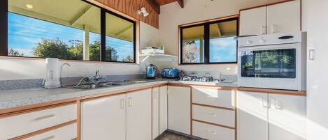 Fridge, microwave, toaster, cookware/dishes/utensils