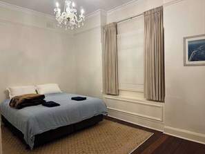 2 bedrooms, desk, iron/ironing board, travel crib