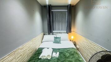 1 habitación, tabla de planchar con plancha, wifi y ropa de cama