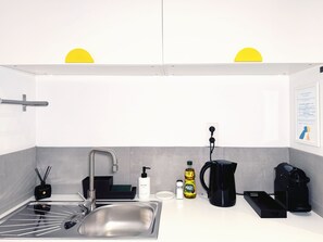 Fridge, microwave, coffee/tea maker, electric kettle