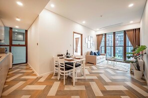 Appartement Deluxe, 1 chambre, cuisine, vue ville | Coin séjour