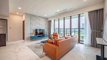 Deluxe Apartment, 3 Bedrooms, City View | Living area