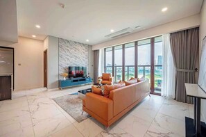 Deluxe Apartment, 3 Bedrooms, City View | Living area