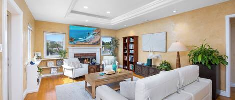 Smart TV, fireplace, table football, books