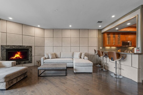Apartment, City View | Living area | Flat-screen TV