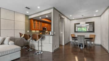 Apartment, City View | Living area | Flat-screen TV