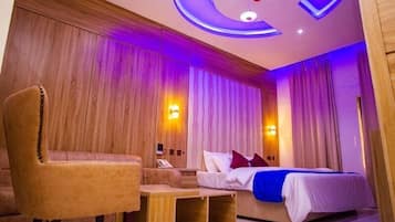 Junior Room, Balcony, City View | In-room safe, desk, laptop workspace, blackout drapes