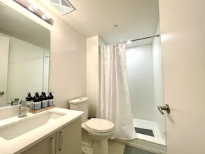 Shower, hair dryer, towels, soap