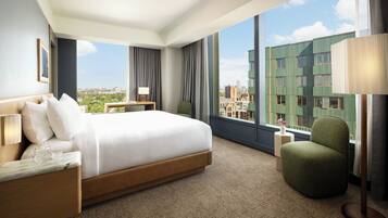 Premium bedding, down comforters, pillowtop beds, minibar
