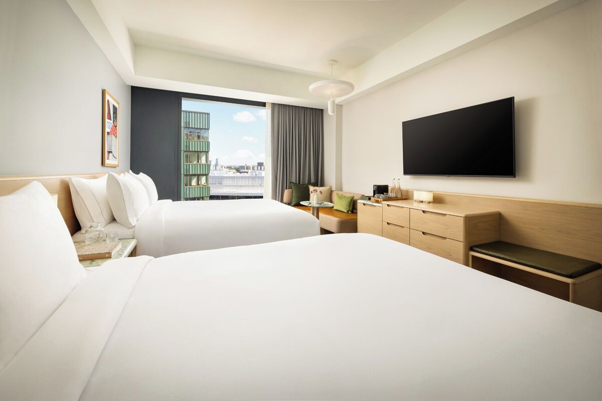 Premium bedding, down comforters, pillowtop beds, minibar