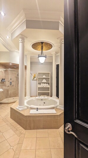 Shower, jetted tub, hair dryer, towels
