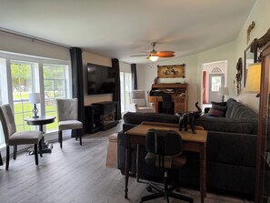 TV, fireplace - Drummond Island Hotel & Vacation Homes - Channel Road Charmer (Drummond)