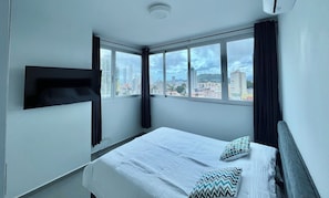Luxury Condo, Ocean View (103) | Laptop workspace, iron/ironing board, free WiFi, bed sheets