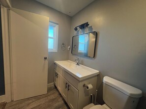Hair dryer, towels, soap, toilet paper