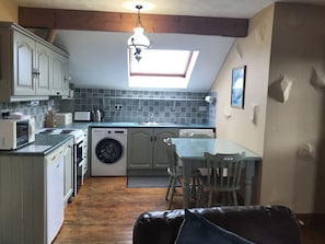 Fridge, highchair, cookware/dishes/utensils