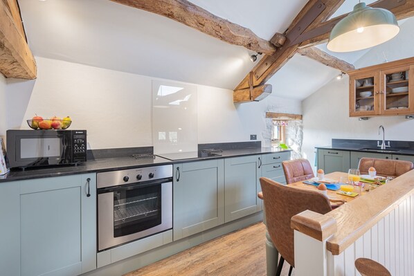 Fridge, microwave, oven, cookware/dishes/utensils