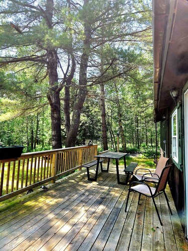 Secluded & quiet, close to town. Stone fireplace inside & a firepit out back