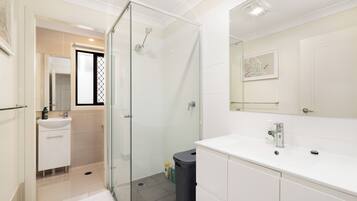 Hair dryer, towels, soap, shampoo