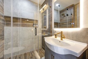 Shower, hair dryer, towels, soap