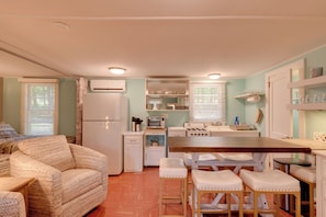 Fridge, stovetop, toaster, cookware/dishes/utensils