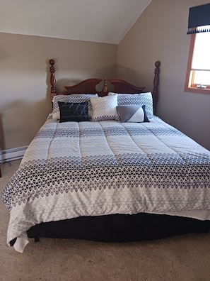 Iron/ironing board, travel crib, free WiFi, bed sheets