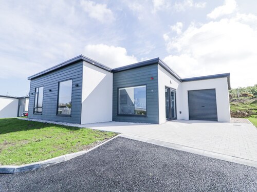 NUMBER 5 VILLA - THE VIEW, with a garden in Derrybeg, County Donegal