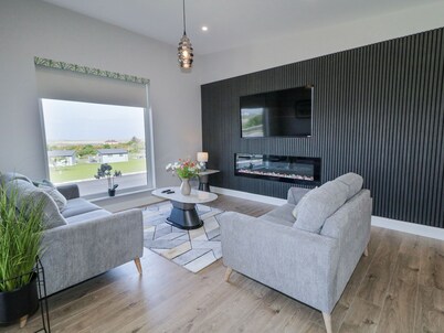 NUMBER 6 VILLA - THE VIEW, with a garden in Derrybeg, County Donegal