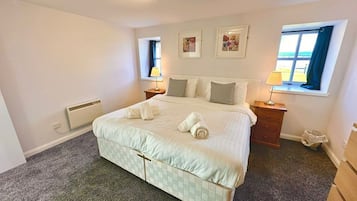 2 habitaciones, tabla de planchar con plancha, wifi y ropa de cama