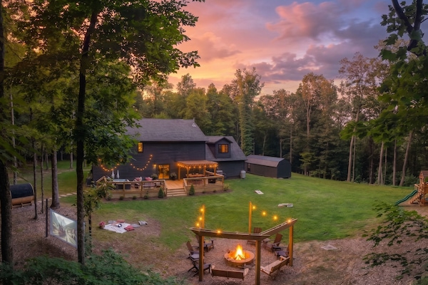Secluded in the woods — fire pit nights & movies under the stars