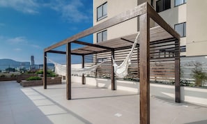 Terrace/patio - Estadia completa com piscina a 400m da Praia da Armação \- SKL (Penha)