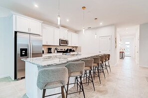 Kitchen with stainless appliances - 9140 Mario Game Room, Theater & Pool! Solara 6BR (Kissimmee)