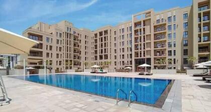 Luxury 2BR w/ Pool, Gym & Balcony – Zahra Breeze