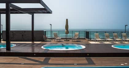 VAC - Beachfront Condo in Itajuba Beach