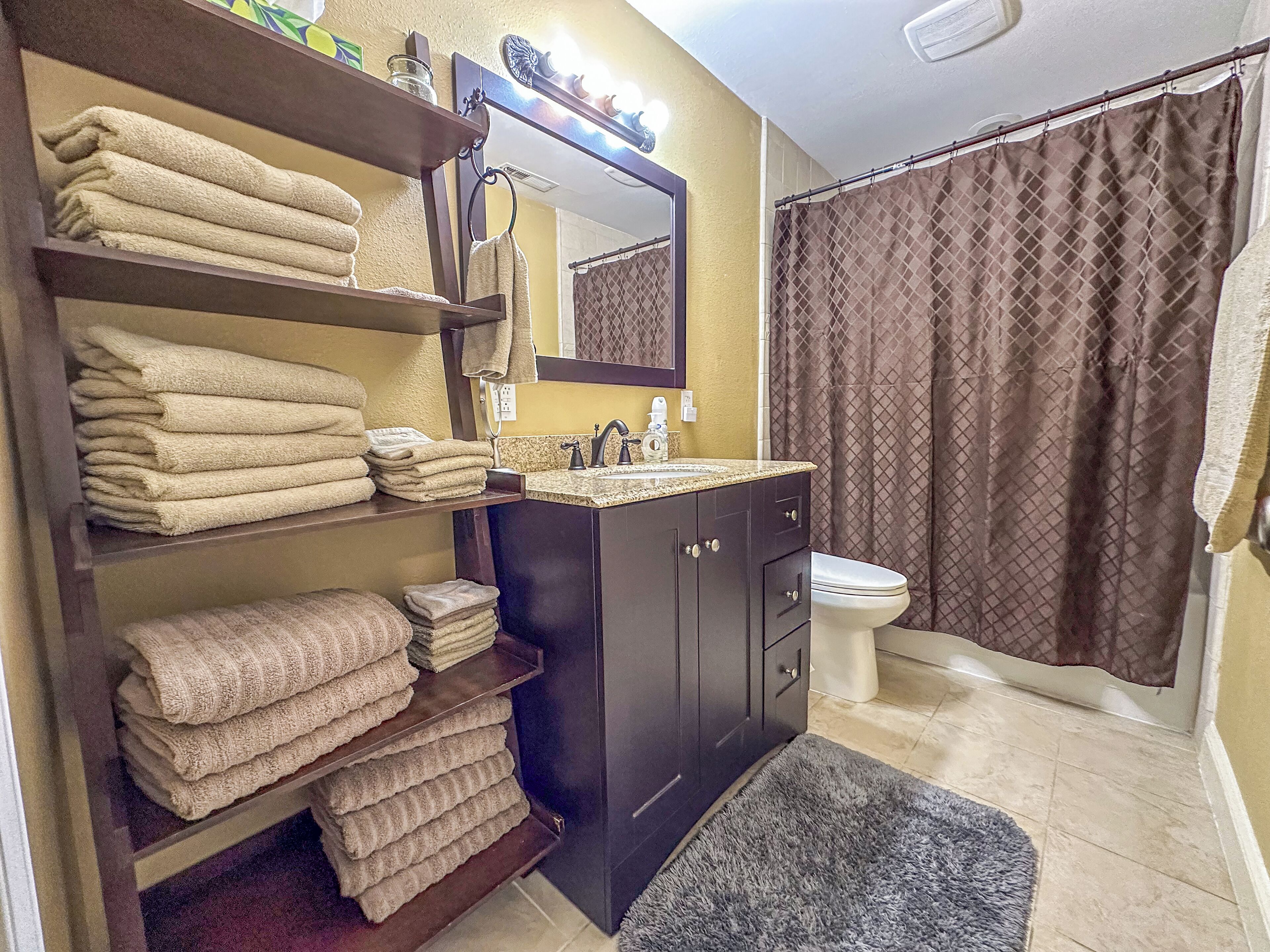 Jetted bath, towels, soap, toilet paper