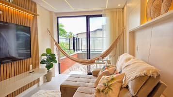 Premier Apartment | Living area | 55-inch Smart TV with digital channels, Netflix, pay movies