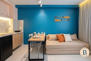 Exclusive Apartment | Living area | 55-inch Smart TV with digital channels, Netflix, pay movies