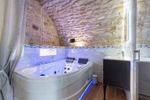 Jetted bath, hair dryer, towels, soap