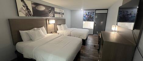 Premium bedding, desk, laptop workspace, free WiFi