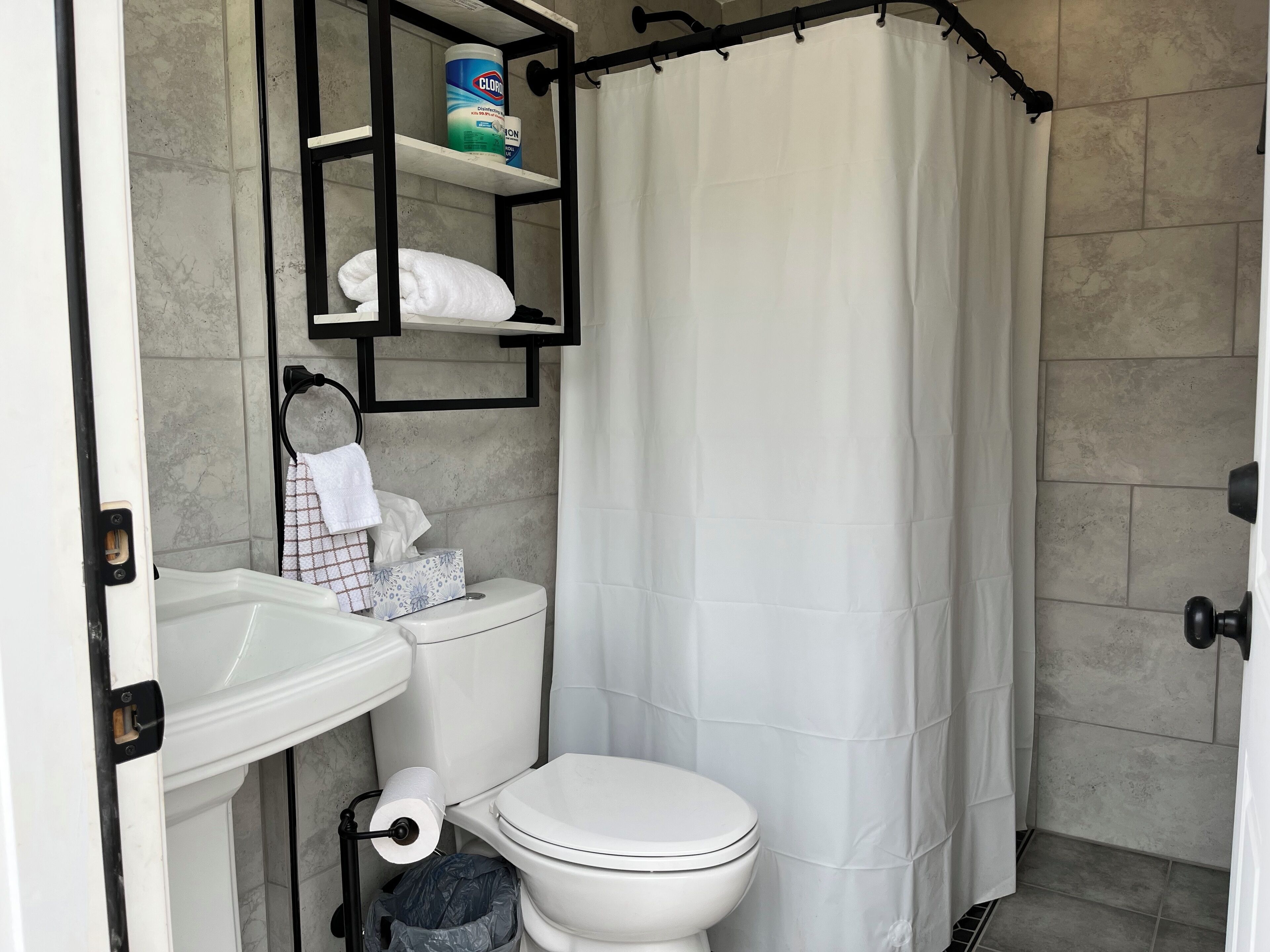 Shower, towels, soap, toilet paper