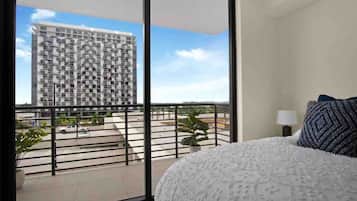 1 bedroom, desk, iron/ironing board, travel crib