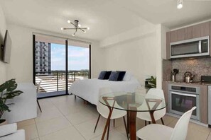 1 bedroom, desk, iron/ironing board, travel crib